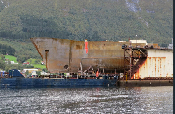 Positioning The Hull On To The Barge