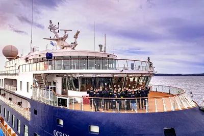 The 'Ocean Victory' and her expedition team, photo by Albatros Expeditions.