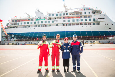 Ulstein site team, here joyously attending the launching ceremony of the first Chinese built expedition cruise vessel at the CMHI yard, and soon ready to perform the inclining test.
