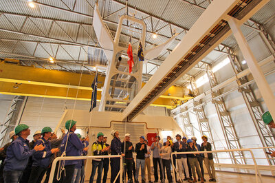 The hand-over ceremony of the NatGeo Resolution.