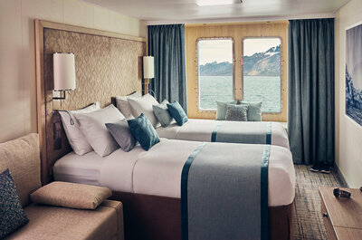 All cabins face outside and have large windows or balconies.