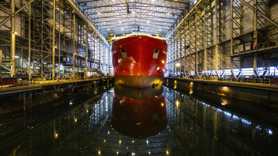 Nexans Aurora being towed out of the dock hall. The dock at Ulstein Verft has a total length of 225m, of which 110m is in the dock hall. Photo: Daniel Osnes