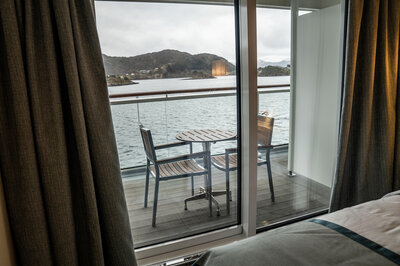 The majority of cabins feature balconies with floor-to-ceiling sliding doors that bring in the spectacular views and ample natural light.