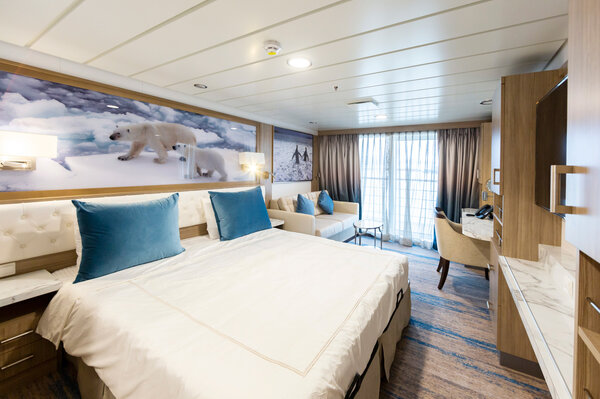 Triple stateroom on the 'Greg Mortimer'.
