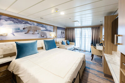 Triple stateroom on the 'Greg Mortimer'.