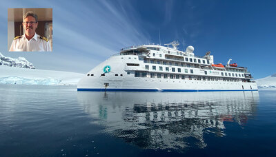 The Master and his ship, photo by Aurora Expeditions.