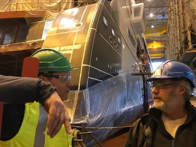 Ulstein and WestCoat paint responsibles attending the start-up of the paint process.