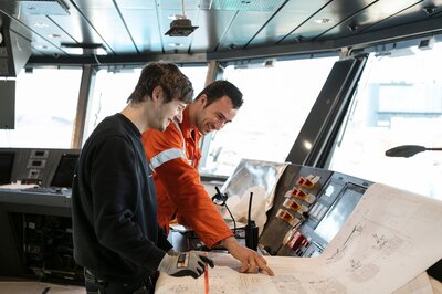 Ulstein's Fredrik Bakke Dimmen and Acta Marine's Matthijs van Os on the bridge.