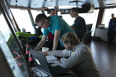 Oliver Reinholz (HSVA) and a design team from Ulstein; Karl Randle, Ivan Schrooyen and Thomas Brauthaug. (Photo: Don Johansson)