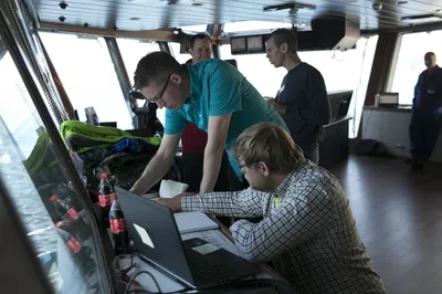 Oliver Reinholz (HSVA) and a design team from Ulstein; Karl Randle, Ivan Schrooyen and Thomas Brauthaug. (Photo: Don Johansson)
