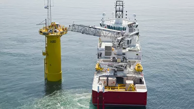 Siem Moxie at work next to offshore wind turbine