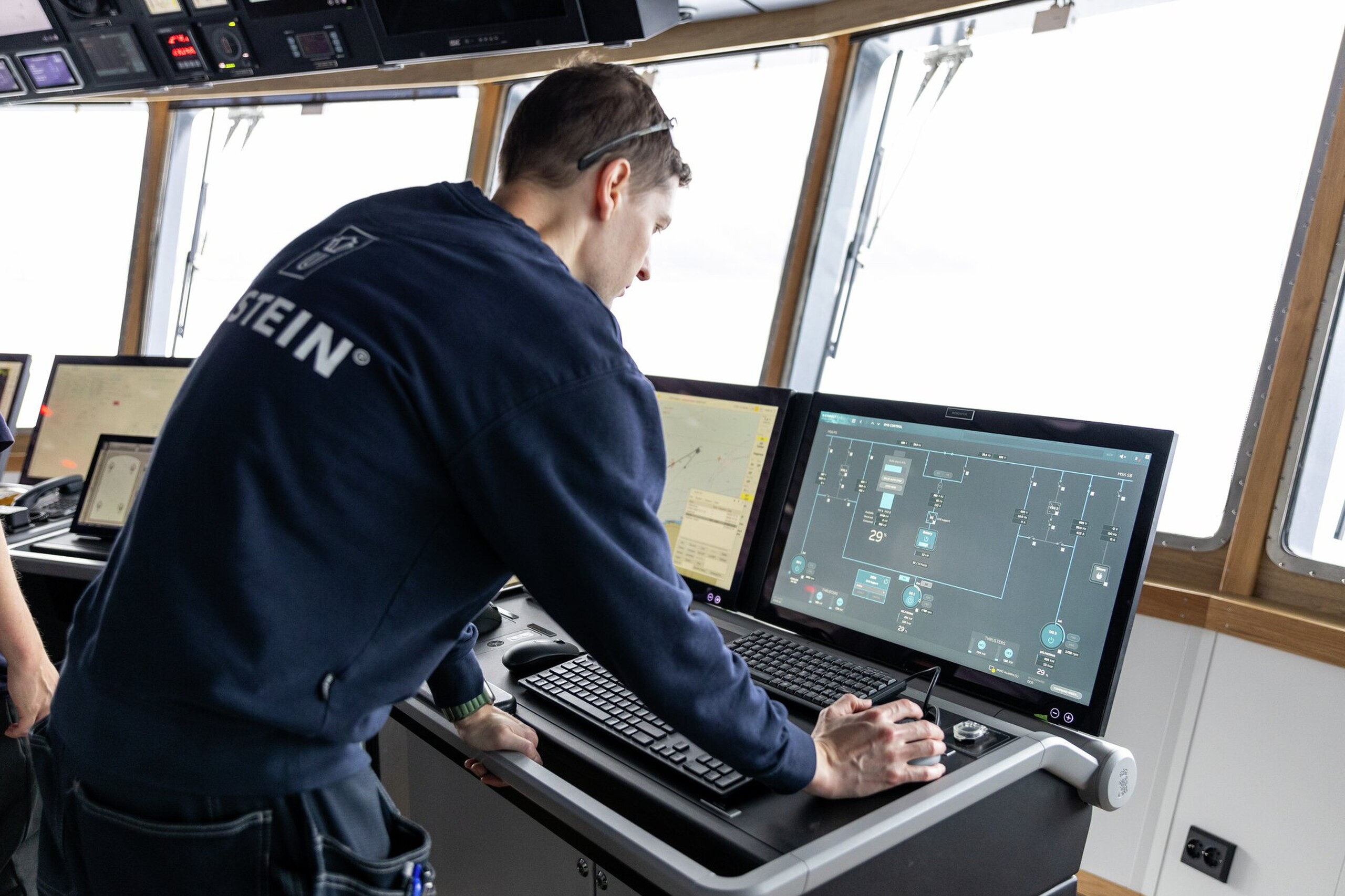 Man looking at ULSTEIN PMS onboard Olympic Notos October 2024